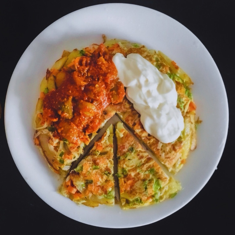 Chipsi mayai chips and egg omelette Tanzanian street food