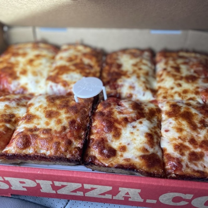 Square Brgr & BOOzy Bites in Westchase — This lively spot is renowned for its Detroit-style square pizzas, featuring a th