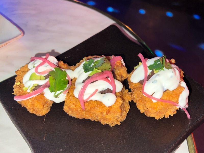 The Dirty Laundry in Channelside — Enter through a faux laundromat to discover The Dirty Laundry, a lively and crea