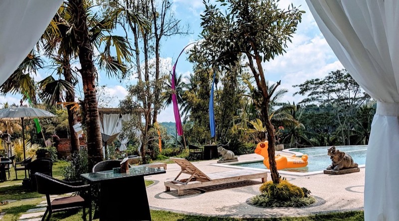 The Kawi Resto with pool and rice terrace views in Tegallalang