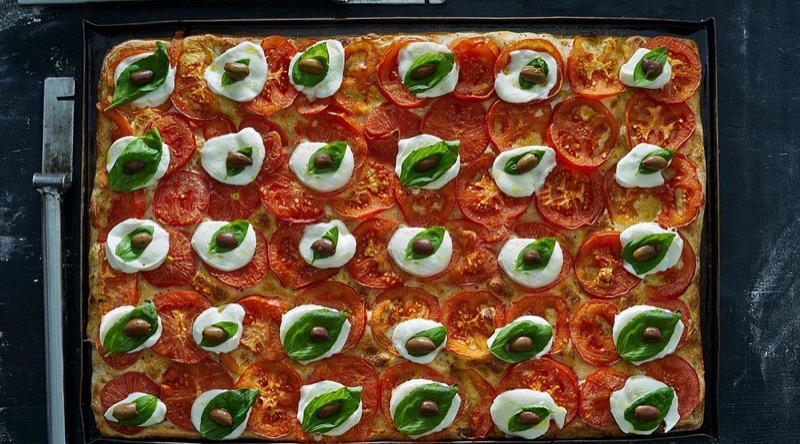 Tony Vespa in Rothschild Blvd — Tony Vespa is a Tel Aviv icon for New York-style pizza by the slice, serving up 