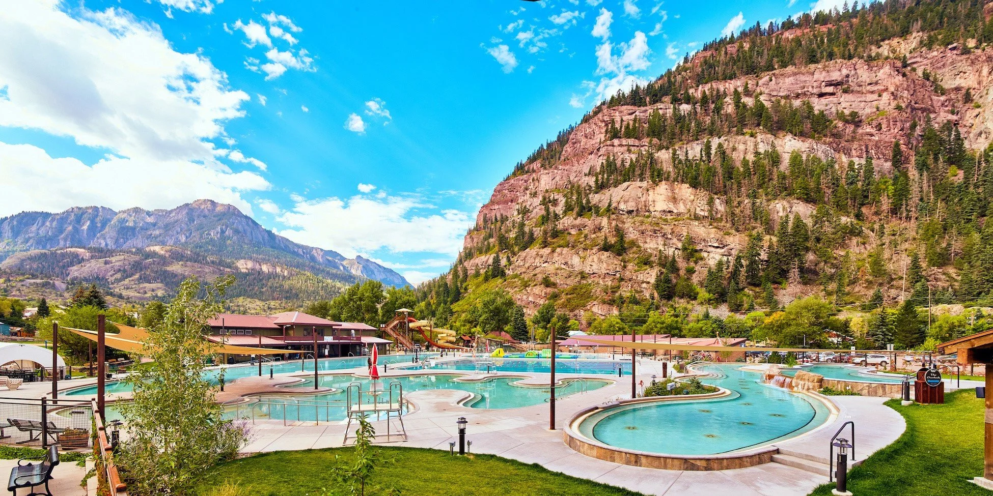 Ouray Hot Springs Pool surrounded by San Juan Mountains