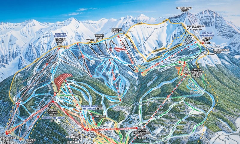 Skiing at Telluride Ski Resort with San Juan Mountains backdrop