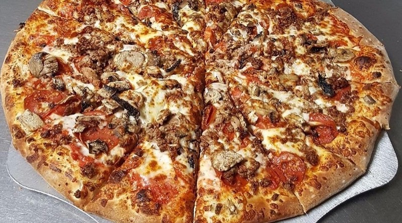 Magpie Pizza in Sam Hughes — Magpie Pizza is a local favorite for authentic New York-style pizza, known for i