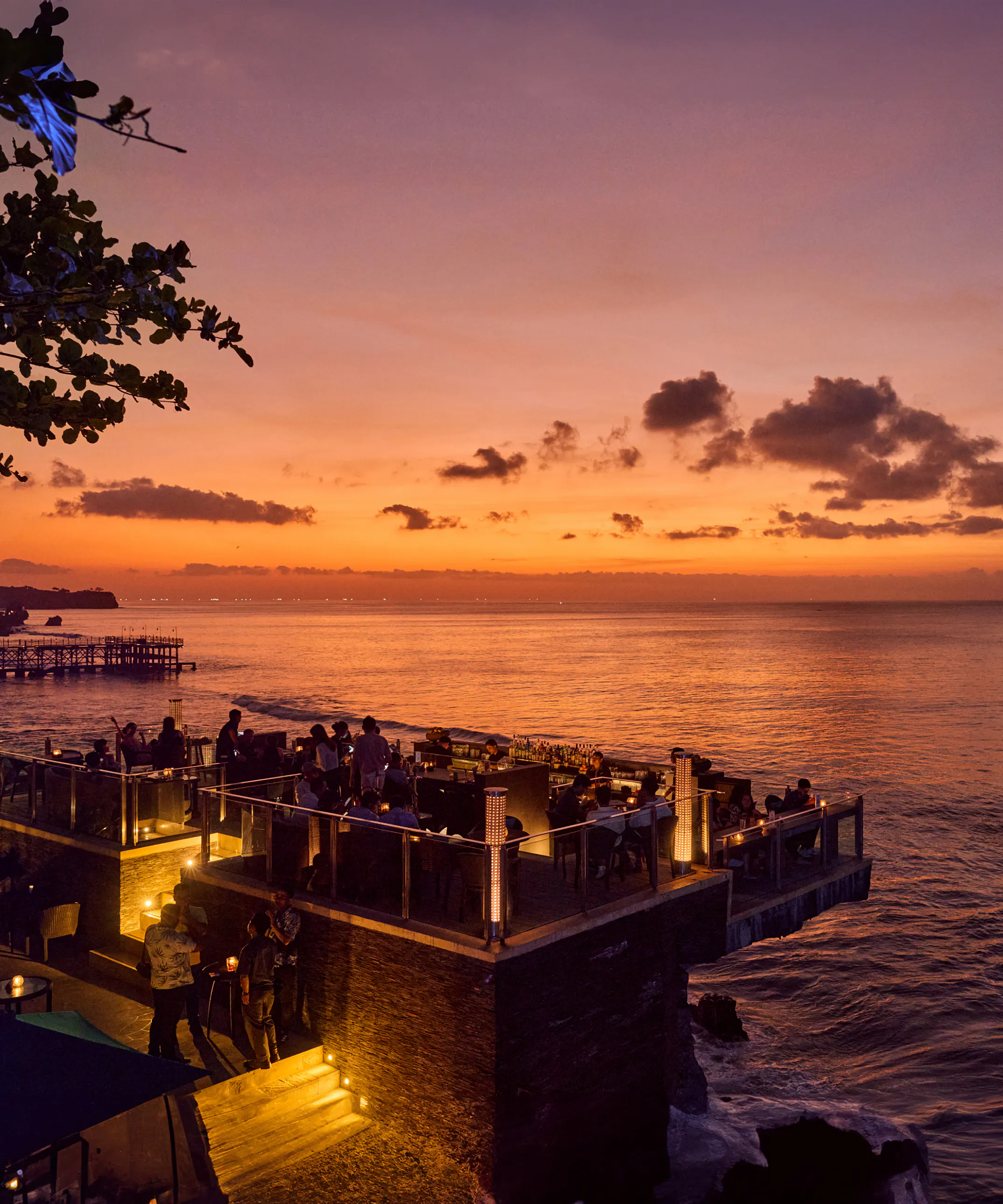 Rock Bar at Ayana Resort built into cliff face above ocean