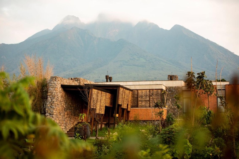 Singita Kwitonda Lodge exterior with volcano views, Volcanoes National Park Rwanda